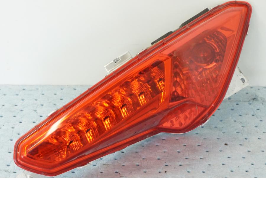 Framsidan på Baklampa från en Yamaha X-Max 250 -2016 scooter.