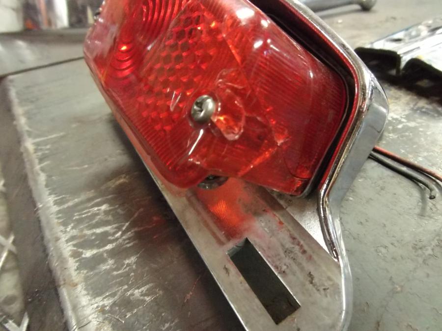 Baksidan på Baklampa från en H-D Softail Custom FXSTC -1987 motorcykel.