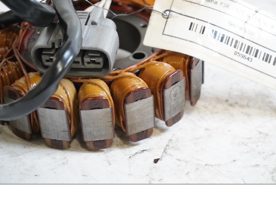 Baksidan på Generator från en Yamaha FJR 1300 -2016 motorcykel.