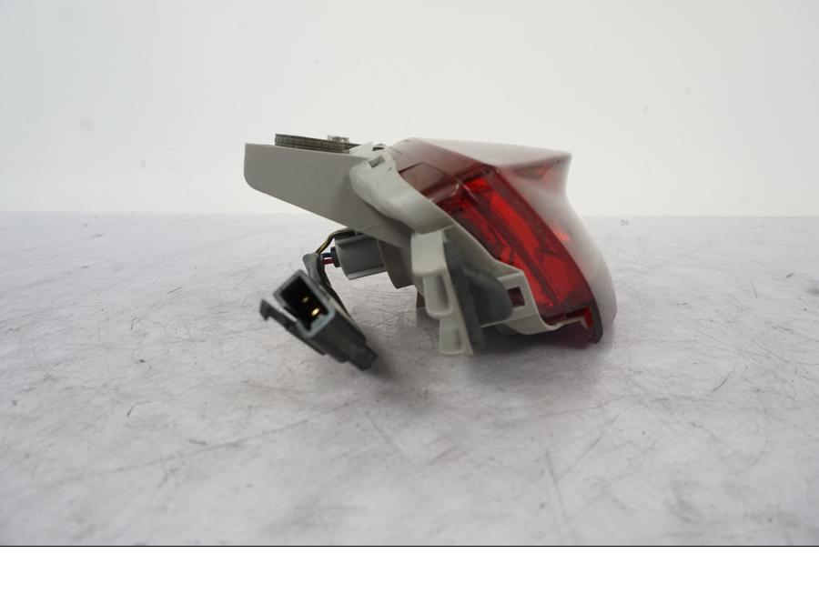 Vänster sida på Baklampa från en Kawasaki ER-6N -2008 motorcykel.