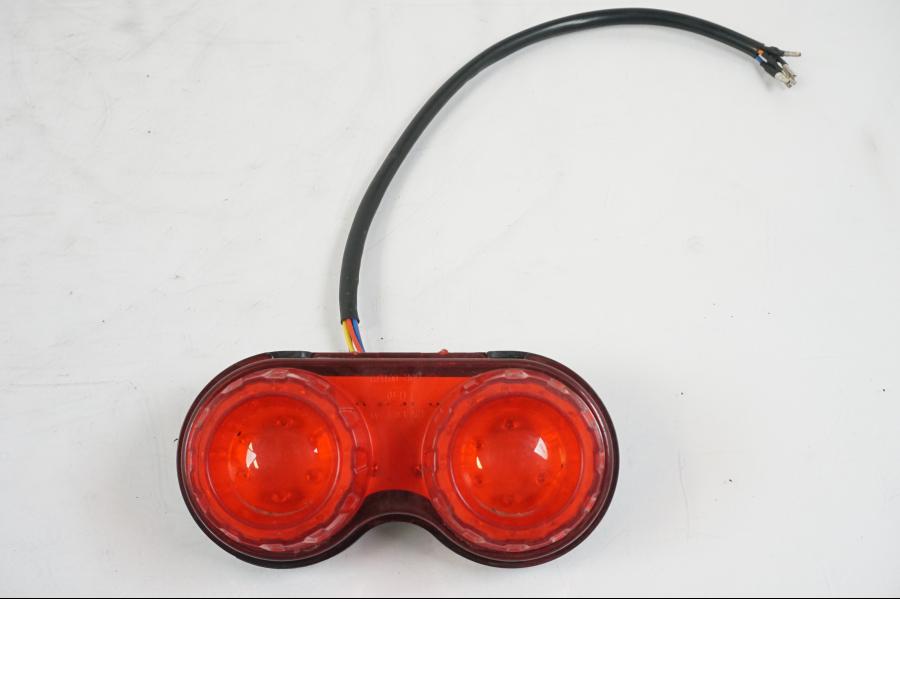 Framsidan på Baklampa från en Aprilia RS 125 -2000 motorcykel.