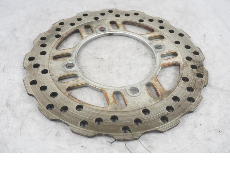 Framsidan på Bromsskiva från en Kawasaki ZZ-R 1400 -2010 motorcykel.