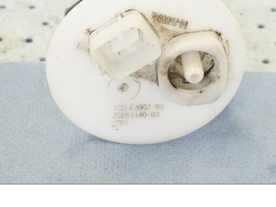 Vänster sida på Bensinpump insprut från en Yamaha X-Max 250 -2016 scooter.