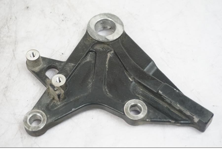 Framsidan på Bromsoksfäste från en Triumph Tiger -2009 motorcykel.