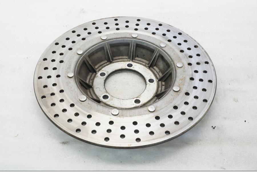 Framsidan på Bromsskiva från en BMW R 90 -1975 motorcykel.