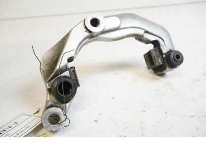 Baksidan på Bromsoksfäste från en Yamaha XVS 650 -1997 motorcykel.