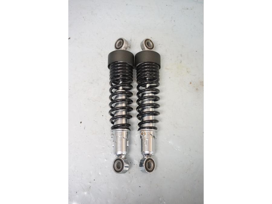 Baksidan på Stötdämpare från en Triumph Street Twin -2016 motorcykel.