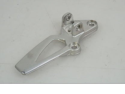 Framsidan på Fotpinnefäste från en BMW R Ninet -2017 motorcykel.