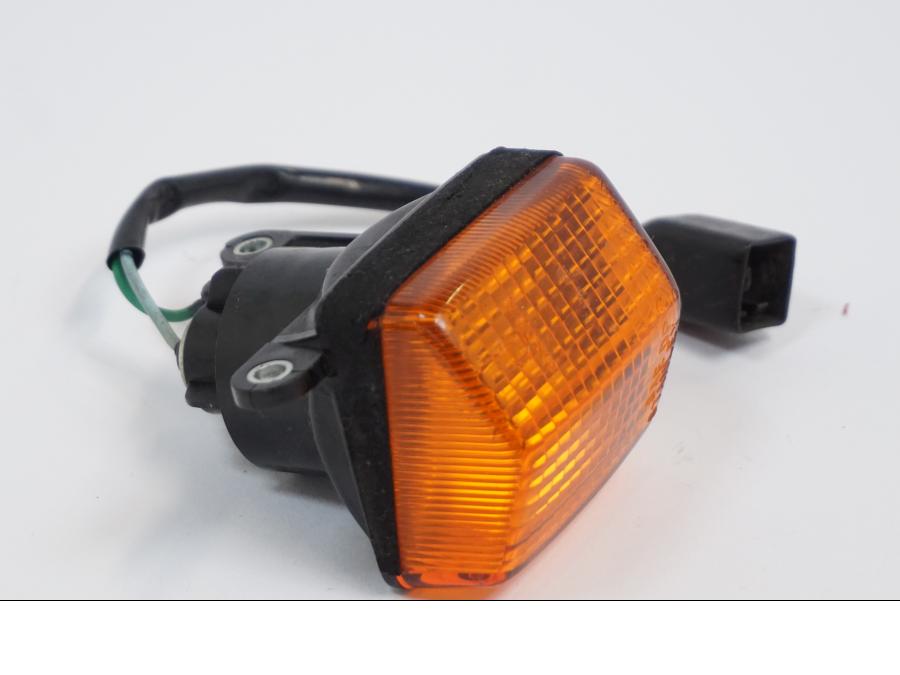 Vänster sida på Blinkers från en Honda NX 650 -1992 motorcykel.