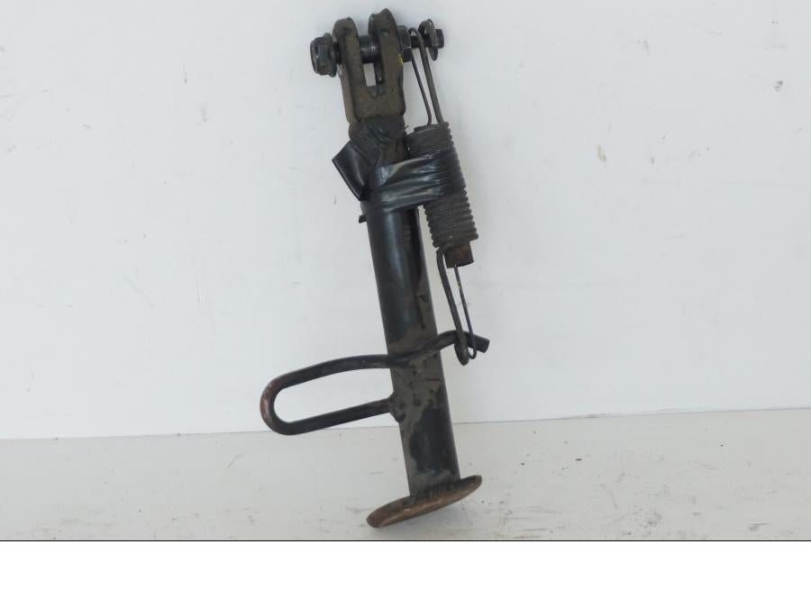 Baksidan på Sidostöd från en Honda SH 300 A -2011 scooter.