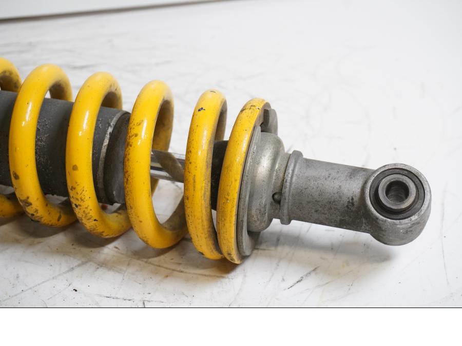 Vänster sida på Stötdämpare från en Triumph TT 600 -2000 motorcykel.