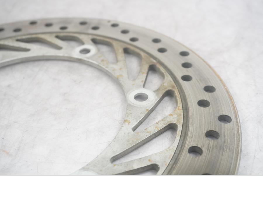Framsidan på Bromsskiva från en Honda CBR 1000 F -1989 motorcykel.
