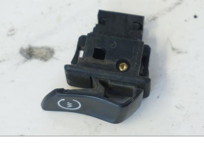 Vänster sida på Tryckknappsreglage från en Honda SH 300 A -2011 scooter.