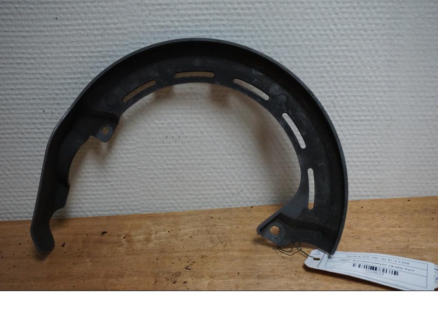 Baksidan på Bromsskivsskydd från en Yamaha XTZ 750 -1992 motorcykel.