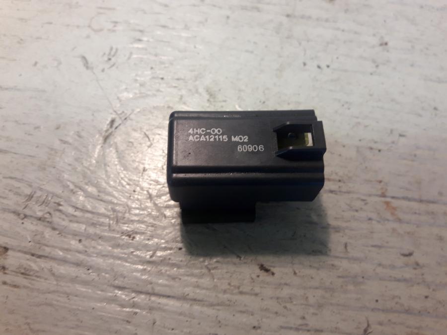 Framsidan på Relä från en Yamaha Cygnus -2007 motorcykel.