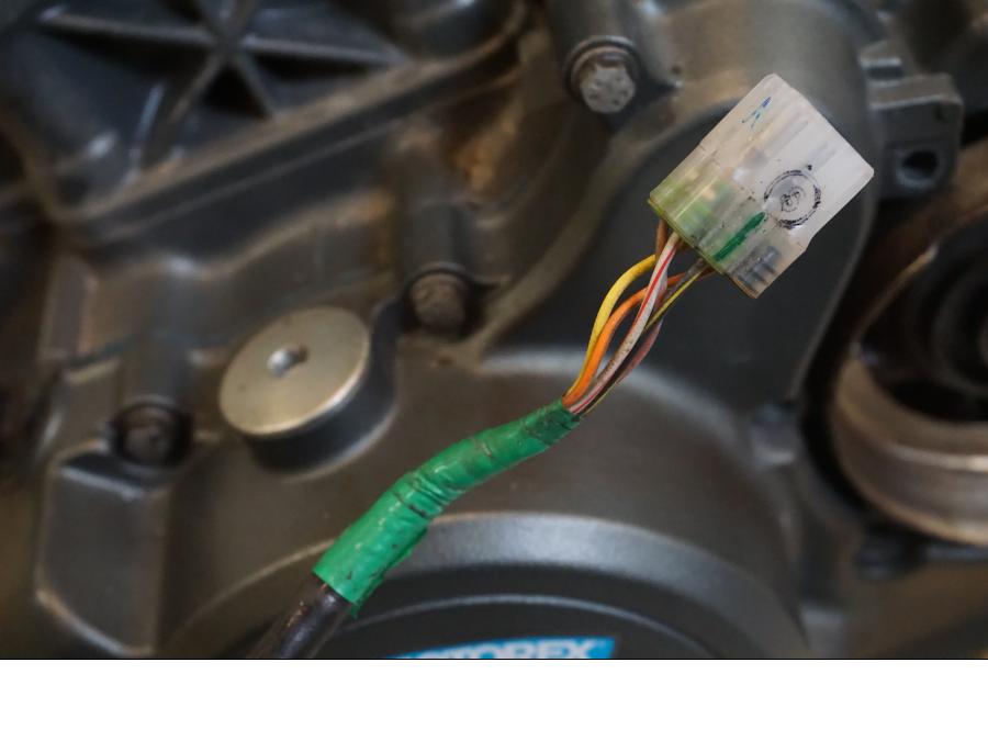 Baksidan på Motor från en KTM 125 Duke -2018 motorcykel.