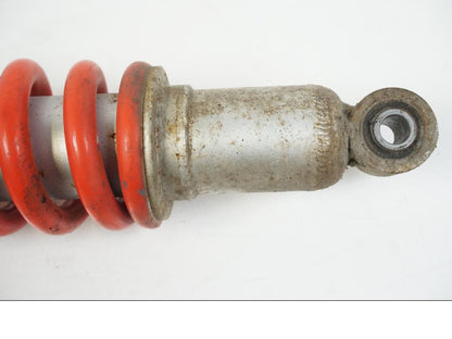 Snett uppifrån på Stötdämpare från en Honda CBR 125 R -2006 motorcykel.