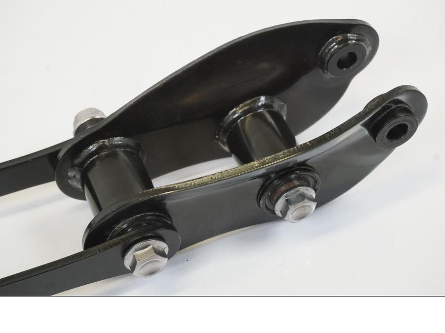 Baksidan på Stötdämparlänkage från en Triumph Trident -2021 motorcykel.