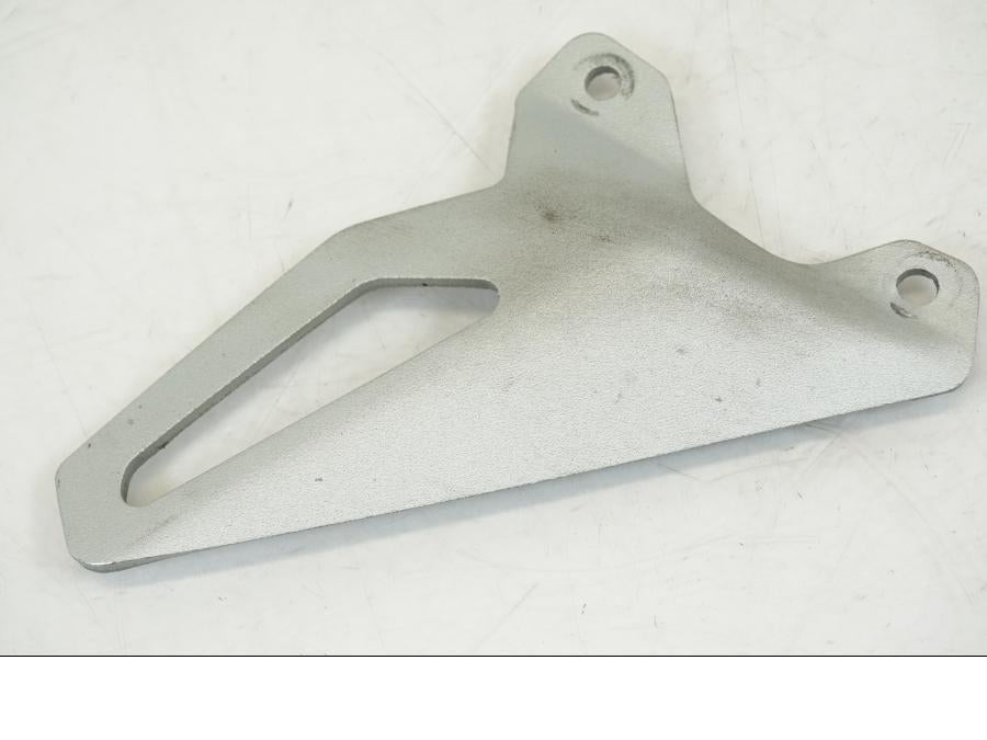 Vänster sida på Fotpinnehälskydd från en Ducati Streetfighter V4 -2020 motorcykel.