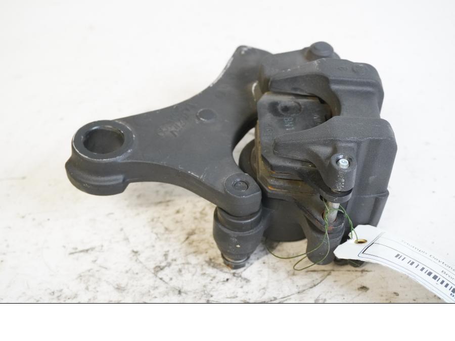 Baksidan på Bromsok från en Triumph Daytona 675 -2009 motorcykel.