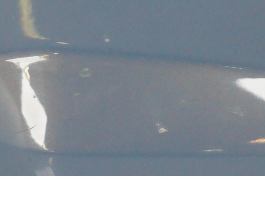 Baksidan på Sidkåpa från en BMW F 650 CS -2002 motorcykel.