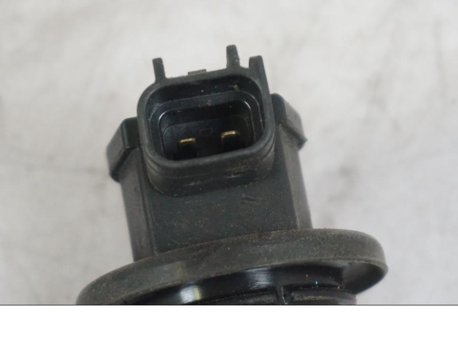 Baksidan på Tändspole från en Triumph Tiger -2009 motorcykel.