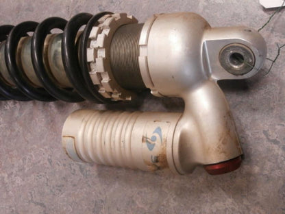 Vänster sida på Stötdämpare från en Husqvarna TE 310 -2009 motorcykel.