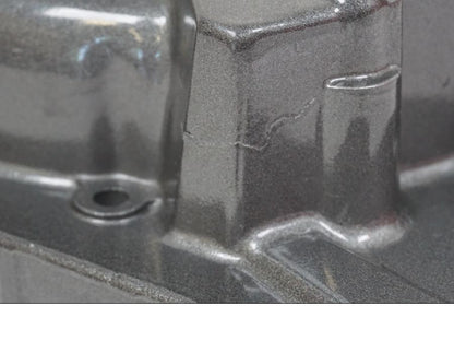 Snett nerifrån på Generatorkåpa från en Yamaha TT 600 S -1995 motorcykel.