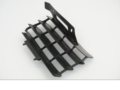 Snett uppifrån på Vattenkylgaller från en Yamaha WR 125 -2010 motorcykel.