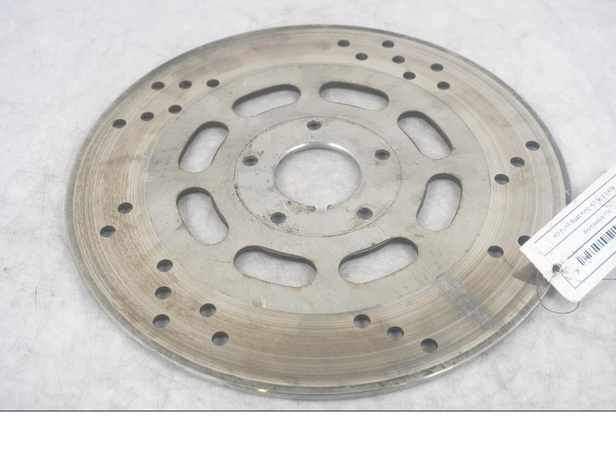 Framsidan på Bromsskiva från en H-D Touring Road King FLHR/I -1997 motorcykel.