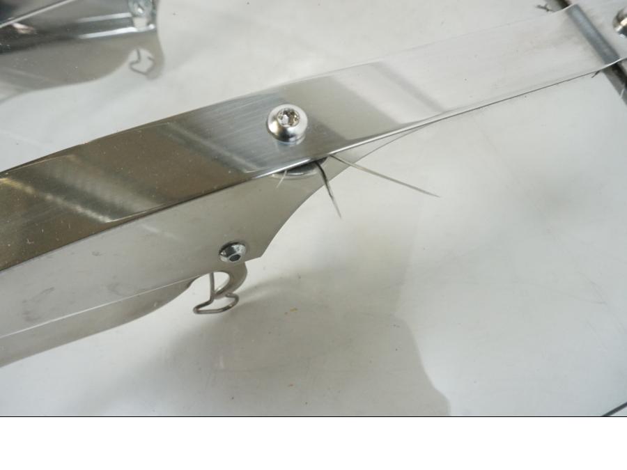 Vänster sida på Vindruta från en H-D Dyna Switchback FLD -2005 motorcykel.