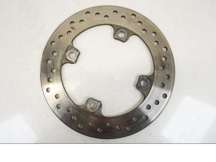 Snett uppifrån på Bromsskiva från en Triumph TT 600 -2002 motorcykel.