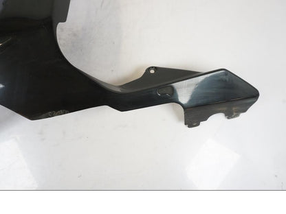 Vänster sida på Sidkåpa från en Honda CBR 900 RR -2003 motorcykel.