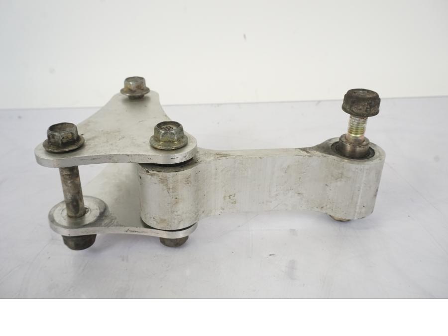 Vänster sida på Stötdämparlänkage från en Honda VFR 750 -1994 motorcykel.