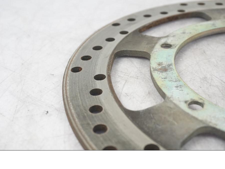 Vänster sida på Bromsskiva från en Yamaha XT 600 -1999 motorcykel.