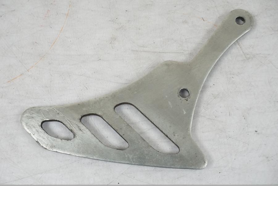 Höger sida på Kedjeskydd från en Triumph Daytona 955I -2000 motorcykel.