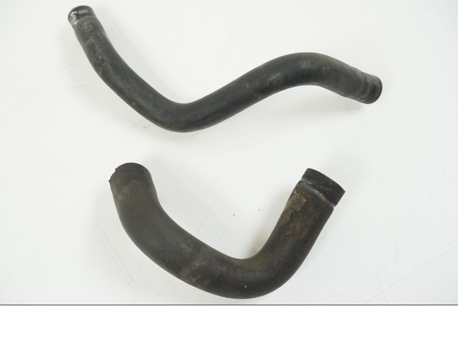 Vänster sida på Vattenkyl Slang Set från en Honda CBR 125 R -2006 motorcykel.