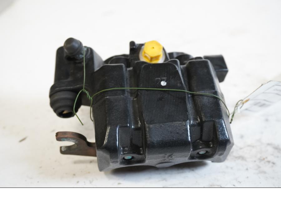 Baksidan på Bromsok från en Kawasaki Ninja 300 -2014 motorcykel.