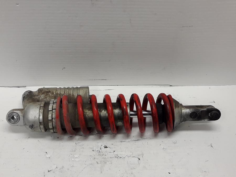 Baksidan på Stötdämpare från en Husqvarna TE 630 -2011 motorcykel.