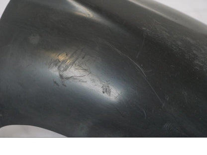 Snett nerifrån på Svingskärm från en Aprilia RS 125 -2000 motorcykel.