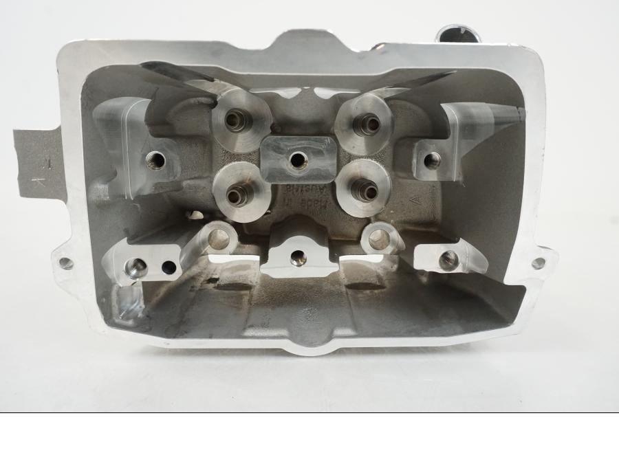 Vänster sida på Topplock från en KTM 250 SX-F -2008 motorcykel.