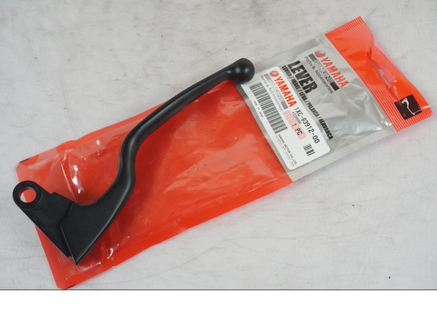 Framsidan på Kopplingsgrepp från en Yamaha XV 950 R -2014 motorcykel.