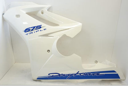 Framsidan på Sidkåpa från en Triumph Daytona 675 -2010 motorcykel.