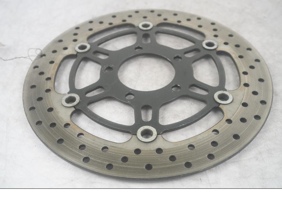Höger sida på Bromsskiva från en Suzuki SV 650 -2003 motorcykel.