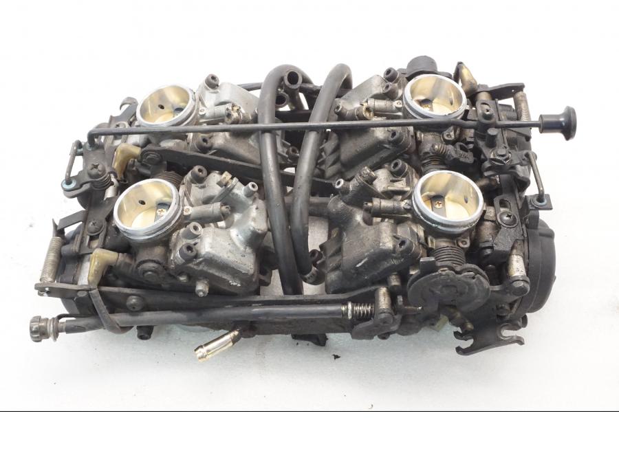 Baksidan på Förgasare från en Yamaha XVZ 13TD -1999 motorcykel.