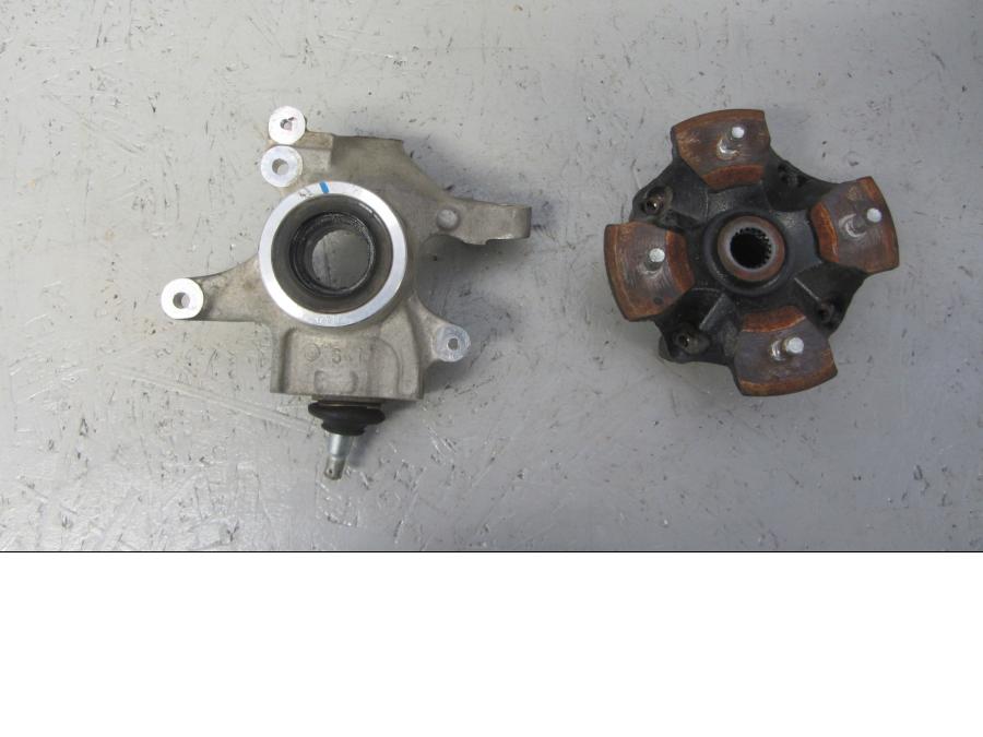 Baksidan på Spindel från en Suzuki LTA 750 XP E -2009 motorcykel.