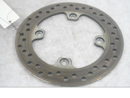 Höger sida på Bromsskiva från en Triumph Street Triple -2009 motorcykel.