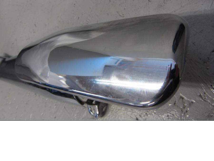 Höger sida på Värmeskydd från en Triumph Thunderbird 1600 -2011 motorcykel.