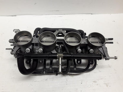 Framsidan på Spjällhus från en Suzuki GSX-S 1000 -2018 motorcykel.