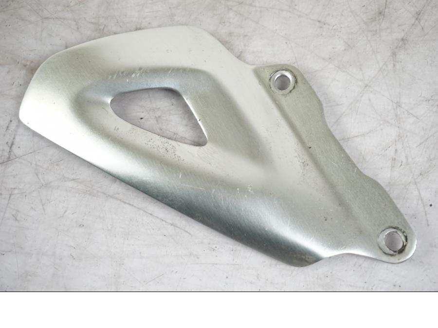 Framsidan på Hälskydd från en Triumph Tiger -2009 motorcykel.